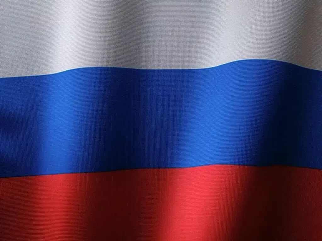 a close up of a red, white and blue flag
